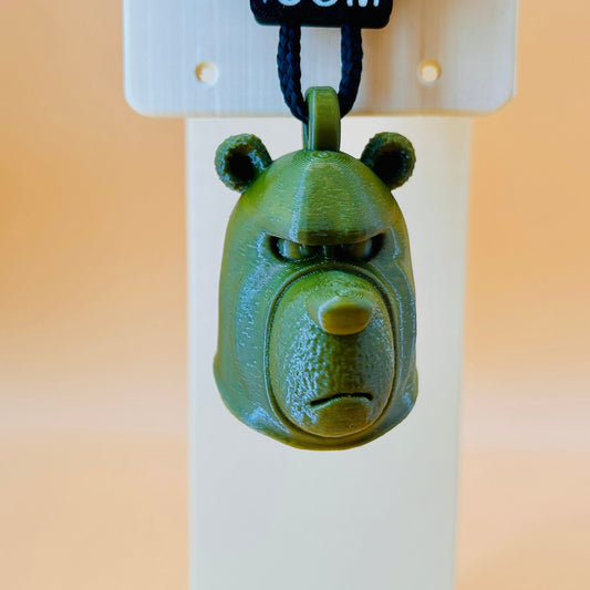 green 3D printed bear with a bandit mask novelty car aroma diffuser