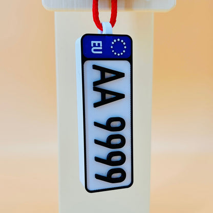 Perfume bottle with a license plate design and '3D Perfume.com' label on a beige background