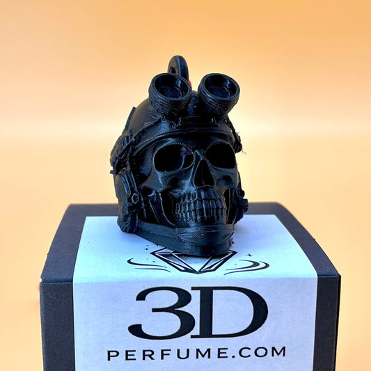 Black skull-shaped perfume diffuser for a car on a 3D box with a warm beige background